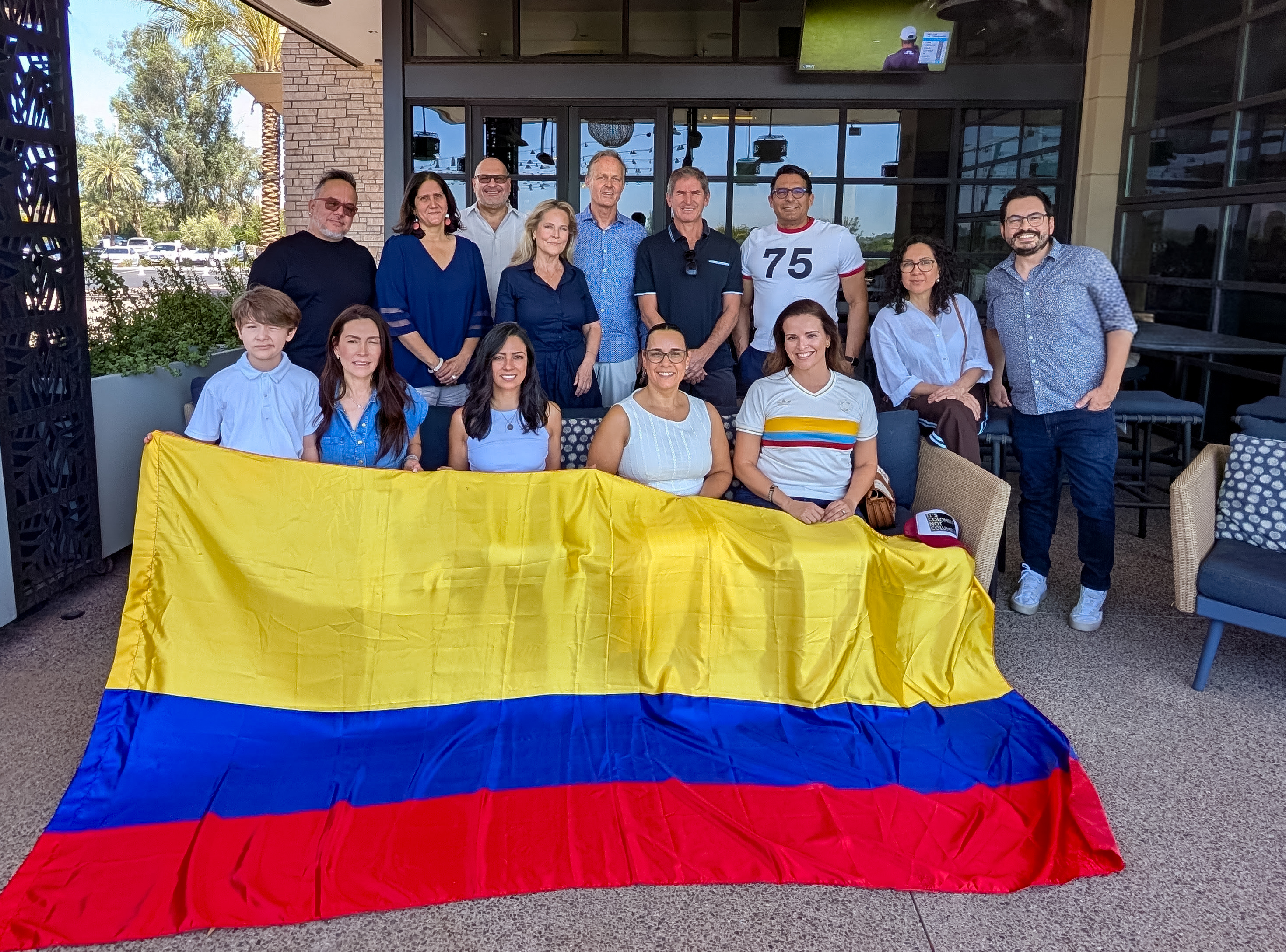Members of Colombians in Arizona gathered with a Colombian flag